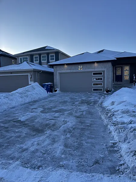 Driveway and walk cleared after a snowfall in Winnipeg Driveway and walk cleared after a snowfall in Winnipeg