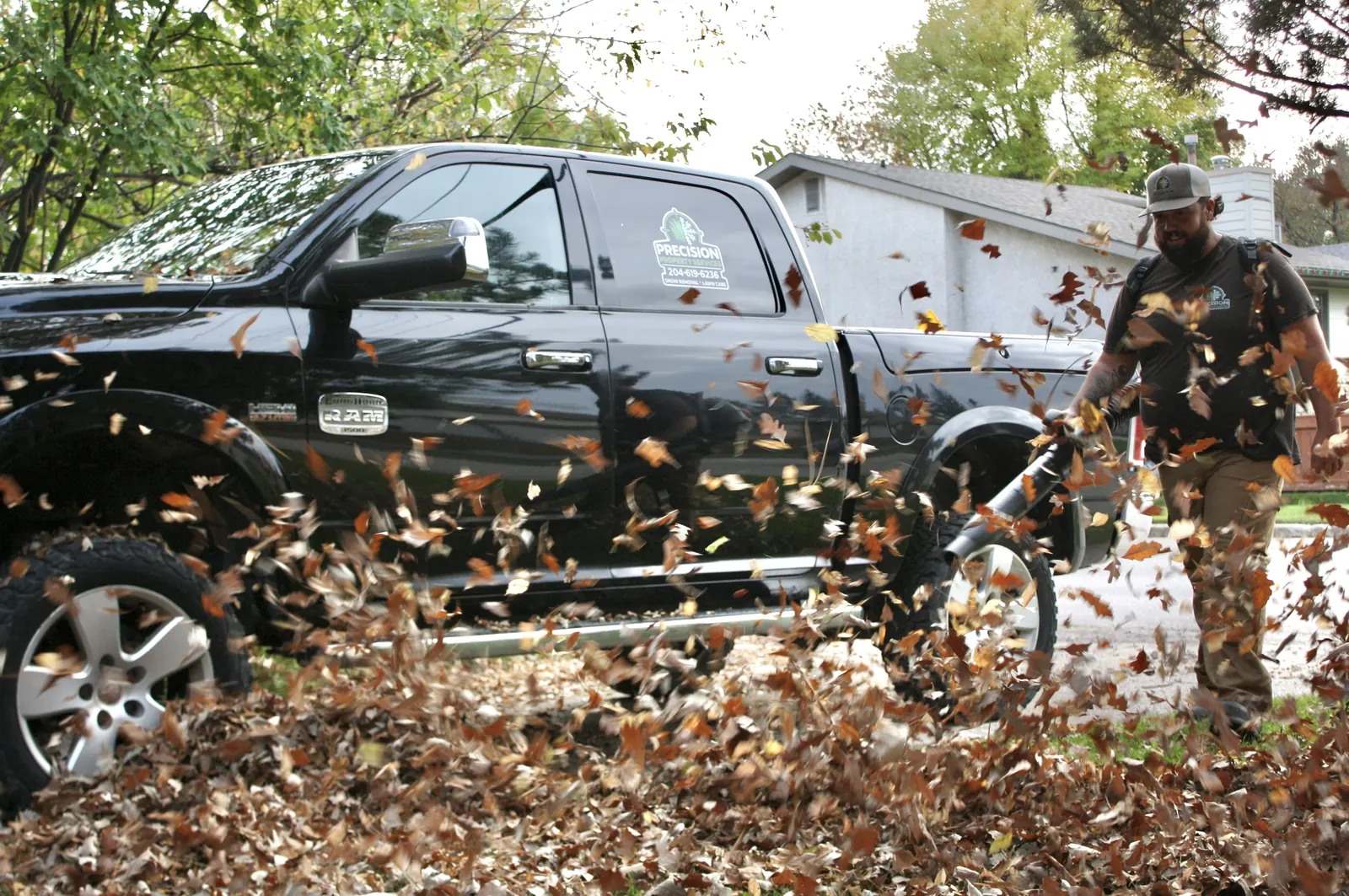 Dylan Tayfel clearing leaves on a fall cleanup in Winnipeg Dylan Tayfel clearing leaves on a fall cleanup in Winnipeg